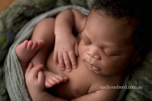 Melissa Sheed Photography Pic 2 - newborn baby holding foot