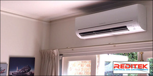 Reditek Electrical & Airconditioning Pic 5 - Over the door high wall installation for a family room