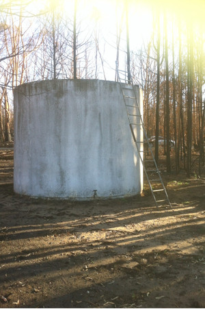 Town & Country Concrete Water Tanks Pic 3 - Town Country Concrete Water Tank after Coonabarabran bushfires of 2013 Still in operation despite the intense heat