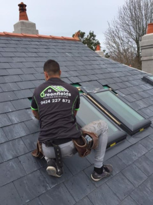 Josgren Roofing Projects Pic 4 - Hard at work finishing of the two newly installed Velux windows