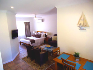 Inn The Tuarts Guest Lodge Pic 2 - Spacious Naturaliste Studio with kitchenette and veranda seating