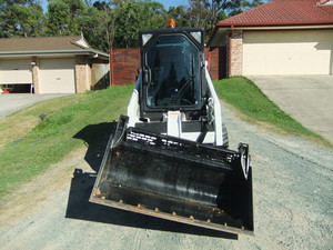 Mango Hill Bobcat Hire Pic 4 - Bobcat with tilt bucket