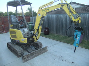 Mango Hill Bobcat Hire Pic 5 - Mini excavator with rockbreaker