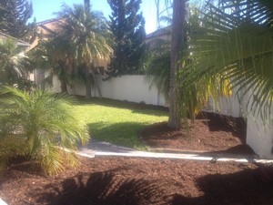 Rejuven8 Property Care Pic 4 - Freshly laid weed mat and mulched garden beds