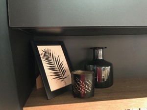 Key Lime Living Pic 3 - Timber shelf and decor to enhance a black kitchen