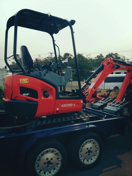 Tas Dry Hire Pic 1 - 18 digger on trailer new