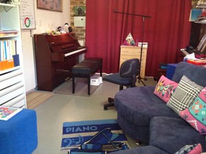 Jeanette's Piano Studio Pic 4 - Inside Jeanettes Piano Studio Kawai upright comfy lounge for parents air conditioned comfort An additional digital keyboard is used as well