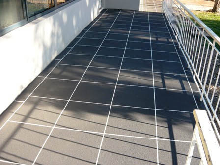 SMK Concreting Pic 1 - tile pattern white base and gunmetal grey top coat to compliment the home