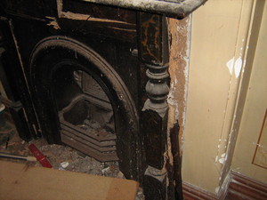 National Pest Solutions Pic 5 - termite damage to a fireplace