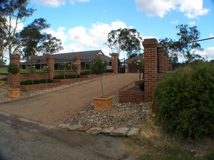 All Hills Fencing Pic 3 - Chainwire fencing between brick piers