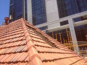 Jim Russell Roofing services Pic 3 - roof tiles removed to allow for new dormer to be built