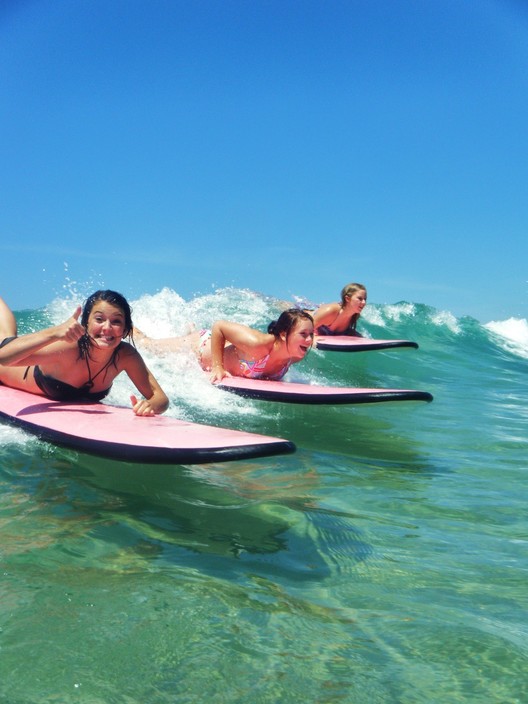 Surf the Bay Surf School Pic 1 - Girls enjoying their Surf Lessons at Surf the Bay Surf School Broulee