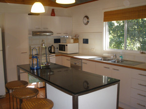 Coochiemudlo Island Family Beach House Pic 4 - Completely selfcontained kitchen offers all the features of a regular kitchen