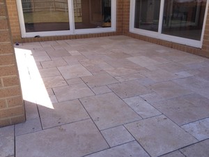 Ian Carmichael Landscapes Pic 3 - Edithvale Landscape project 2017 Patio paved with Travatine natural stone using the french pattern