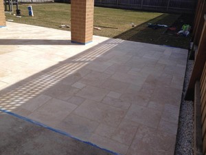 Ian Carmichael Landscapes Pic 4 - Final stage grouting patio before final clean up