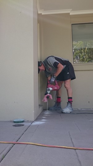 Advantage Pest & Termite Management Pic 5 - Drilling through concrete slab for termite barrier