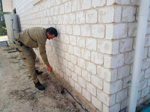 Gympie Termite and Pest Services Pic 3 - Spraying Outside