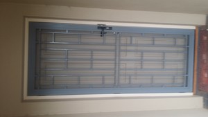 Assured Glass and Aluminium Pic 5 - Decorative cast panel screen door