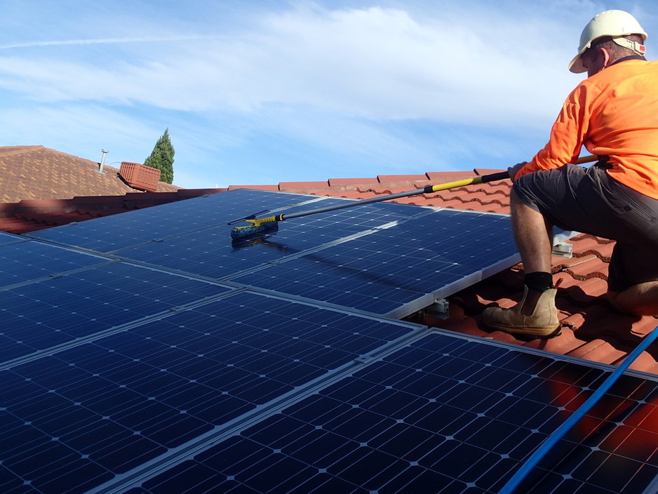 Kenny & Sun Pic 1 - Solar Panel Being Cleaned