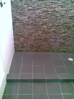 U-Call tiling services Pic 3 - Feature stone wall in shower wall to wall West Perth