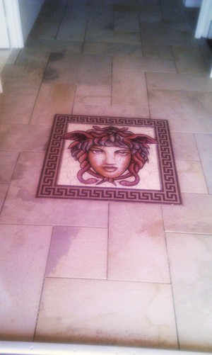 U-Call tiling services Pic 5 - Porcelain tiles in a French style pattern In the entrance the owners wanted Medusas head mosaic The Vines