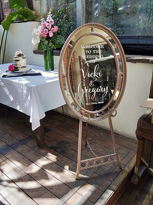 Wedding and Event Hire Pic 1 - Oval vintage rose gold mirror with a Welcome Sign