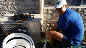 SMART AIRCONDITIONING PTY LTD Pic 2 - On the job installing a split system airconditioner