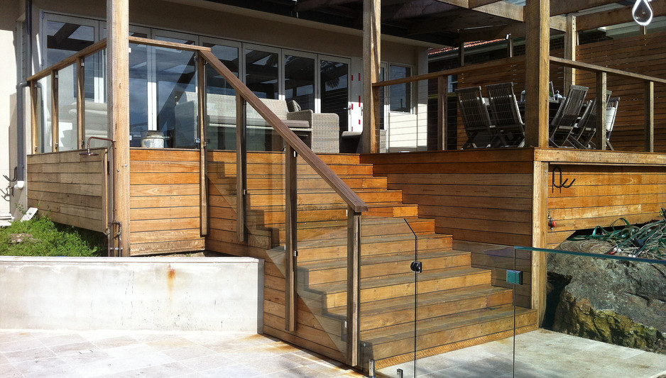 RJH Fencing Solutions Pic 1 - Glass Balustrade with Timber Posts Top Rail