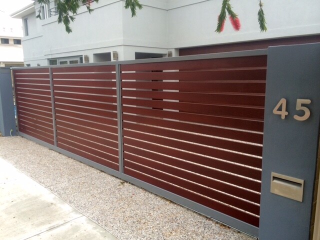 Residential Gates Pic 1 - Automatic Sliding Gate in Aluminium slats Jarrah timberlook KING Italian Automations