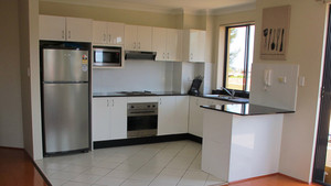 Short-Term Apartment Rentals Pic 3 - Open Plan Kitchen