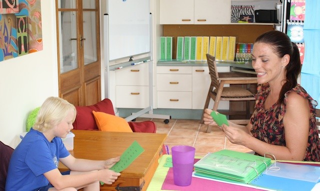 Reach Your Potential Tutoring Centres Pic 1 - Child being tutored by one of our specialists