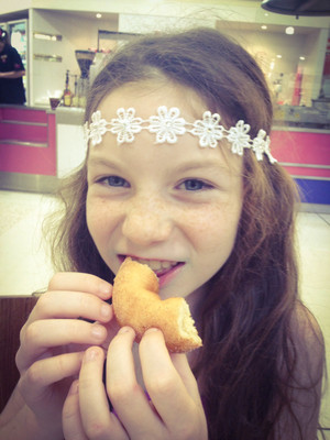 Donut King Pic 3 - My daughter enjoying a cinnamon donut from DK Stocklands Burleigh