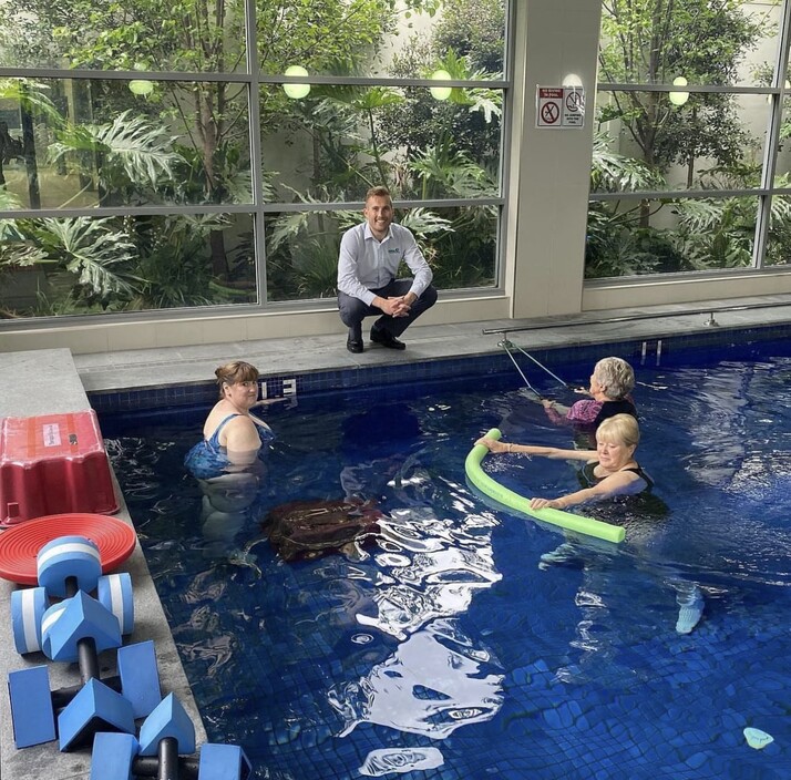 Hydrotherapy Adelaide Pic 1 - A group of individuals engaging in aquatic therapy sessions led by Yates Physiotherapy experts in a hydrotherapy pool in Adelaide focusing on rehabilitation and therapeutic exercises