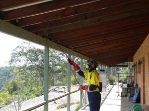 J & L Davies & Sons Pic 2 - Spraying around verandar for webbing spiders