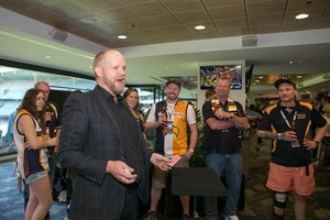 Nicholas J. Johnson - Melbourne Magician Pic 3 - Performing mix and mingle entertainment at Ethiad Stadium on Grand Final Day