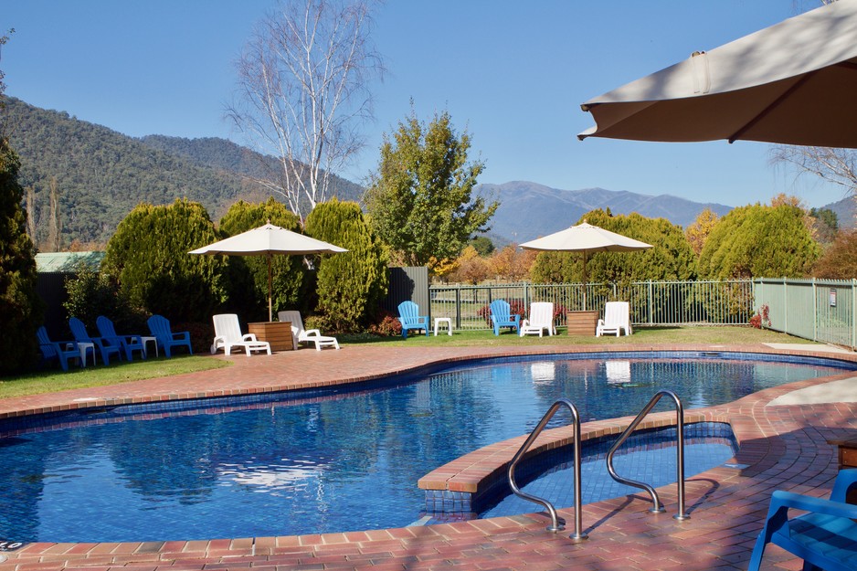 Bright Freeburgh Caravan Park Pic 1 - Our outdoor heated pool overlooking Mt Feathertop