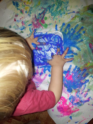 Little Learners Family Day Care Pic 5 - Finger painting is a great tactile experience It supports selfexpression and creativity children learn about colours and mixing them together but most of all its messy and fun