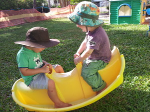 Little Learners Family Day Care Pic 3 - Masters WS RP rock on the seesaw developing fine gross sensory motor skills as they hold rock balance on the seesaw They are also learning social skills as they interact