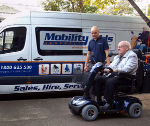 Mobility Aids Australia Pic 3 - Mobility Aids Australia van and worker with customer