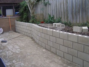 Allabout Bricklaying Pic 3 - Retaining walls reinforced with steel core filled pictured with curved feature