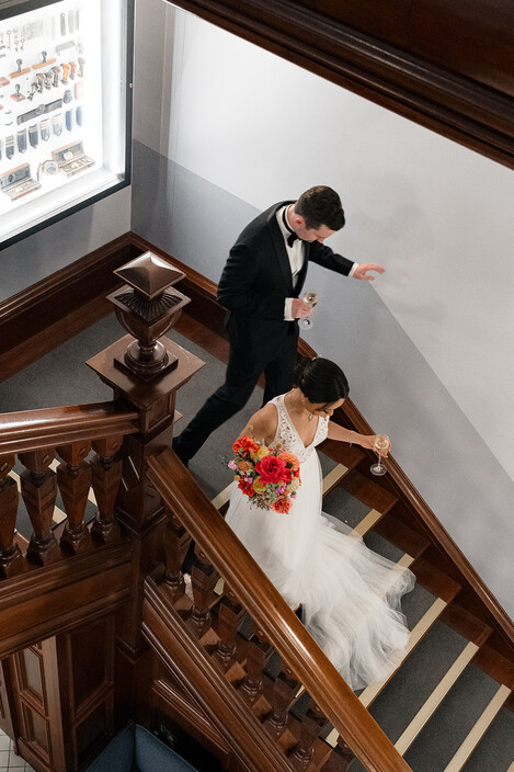 Whistler Photo.video Pic 1 - groom and bride walking down the stairs in Customs House Brisbane