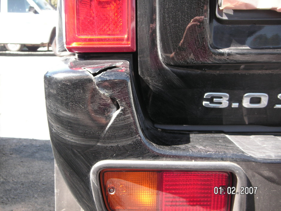 Fast Repairs Pic 1 - rear bumper damage