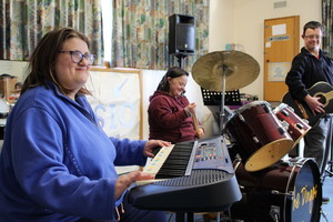 Multicap Tasmania Pic 4 - Emily Ebonie and Dylan having a great time at a Community Access session of The Dingoes band at Miranbeena