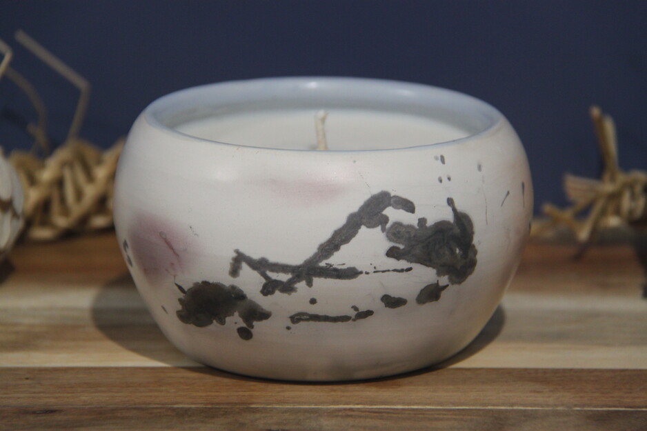 TeeC Ceramics Pic 1 - Handmade Ceramic candle holder with candle Saggar fired with an internal glazes The colouring is unique due to the firing process The candles are made from Soy wax and are lightly scented Candles come in a variety of sizes