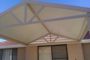 Topline Outdoor Pic 3 - Solar Span Roof complete with Roman Style Posts turned a bland area into a usable place for the kids to play