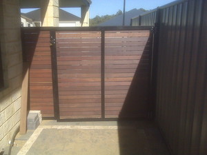 Topline Outdoor Pic 5 - Oiled Timber Slated Gates Infill Panels for the client in Baldivis we also built their Patio they were over the moon at not having to shop at two different places