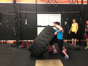 Hills Health and Fitness Pic 2 - Tyre Flips Strong Women training CrossFit New Beginning