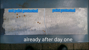 Keeping It Real Car Detailing Pic 4 - this is a piece of sheet metal that I grindered last week and paint protected one side and after one day in the rain and weather the rust has already started to appear on the unprotected side deep lustre paint protection