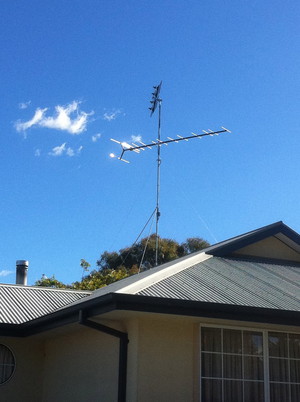 Digital Daniel Pic 5 - Tin Roof New High Gain VHF and UHF Antennas In a Bad Reception Area On a 15 Foot Heavy Duty Guy Wire and Stay Bars Mount