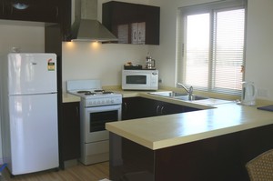 Seaspray Beach Holiday Park Pic 5 - Chalet Kitchen